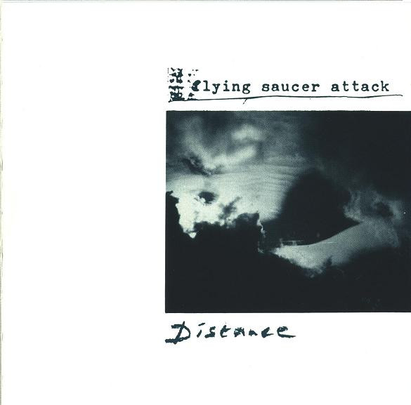 White cover with a photo of a cloudy sky on the side. Name of the band above the image and the album's name below. All artwork in black and dark teal colors